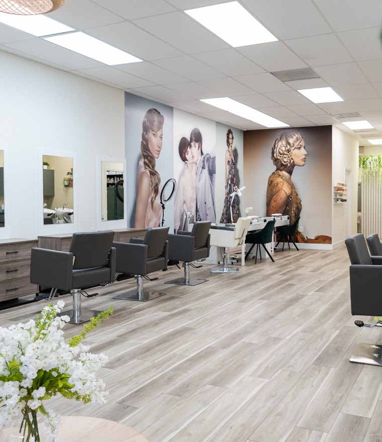 Styling chairs and glam mural wall at Babelle Salon & Spa